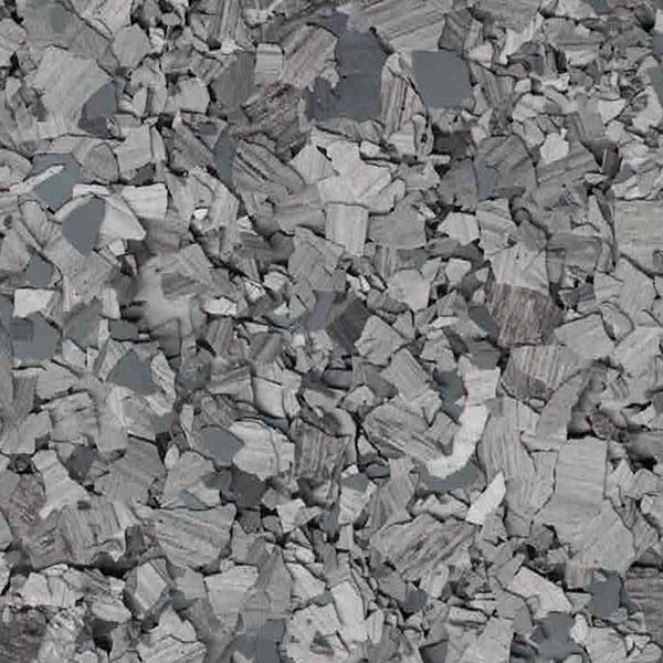 The image shows an abundant pile of gray rectangular stones with varying shades and sizes, slightly resembling cobblestones, but with sharper edges.