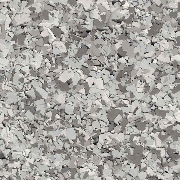 This image shows a texture of many small, irregularly shaped pieces in various shades of gray, resembling a surface of broken stone or concrete.