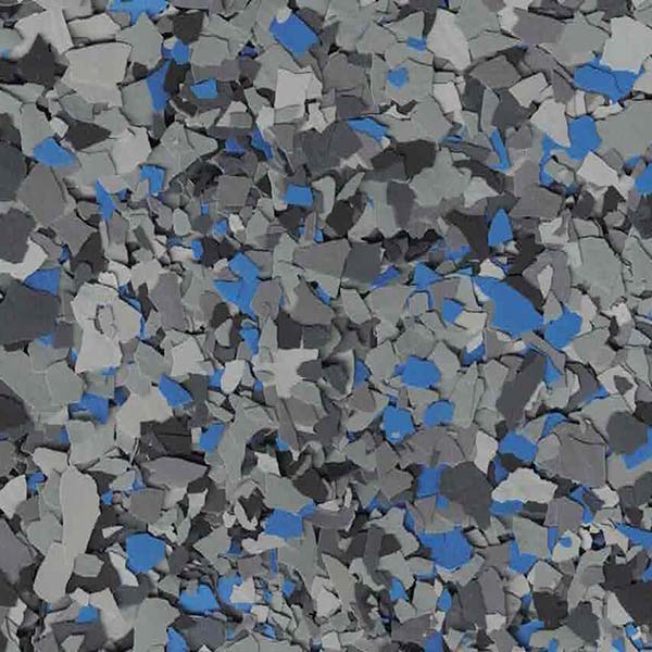 The image shows a collection of irregularly shaped fragments in various shades of gray and blue, closely packed together to form a textured pattern.